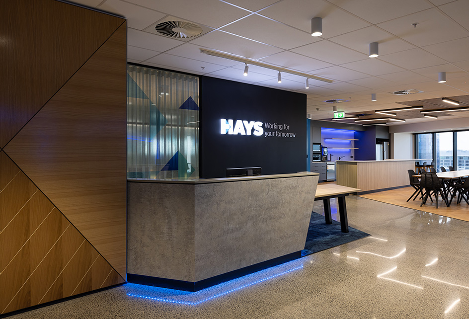 Hays office by stack interiors hi-macs urban concrete and melteca elemental concrete with classic oak feature wall