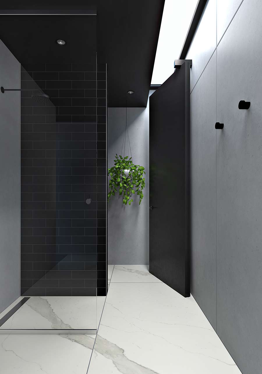 Black subway tiles bathroom