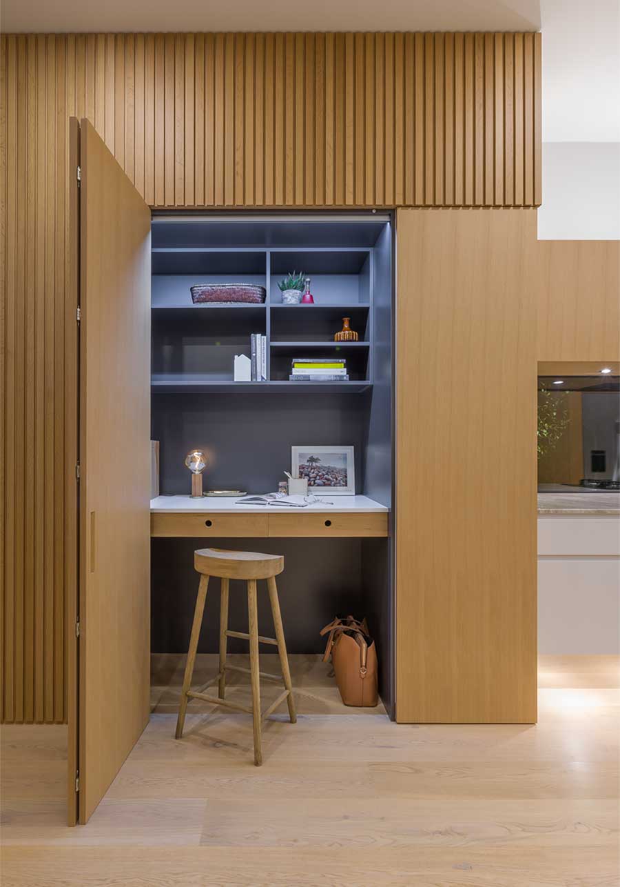 Kitchen with hidden desk and shelves